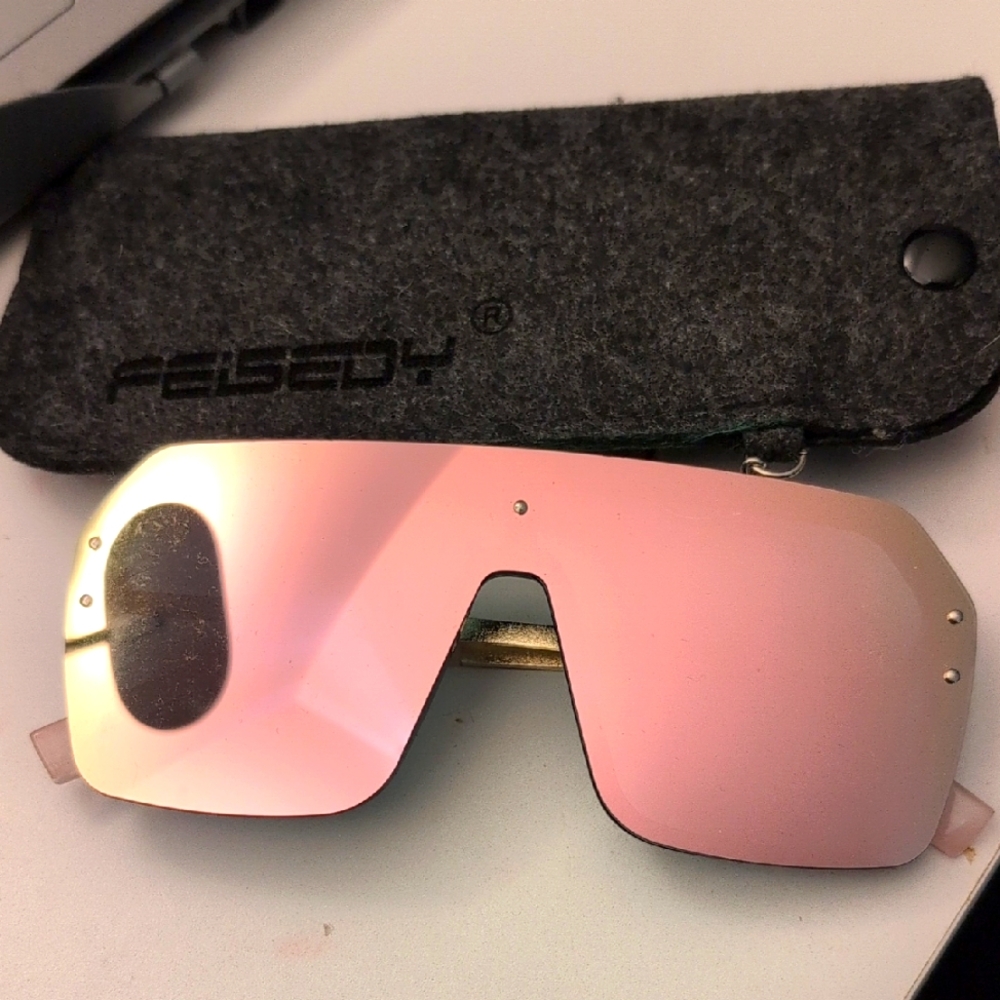 FEISEDY Classic Siamese One Piece Sunglasses Nice Rimless Stylish Retro Design